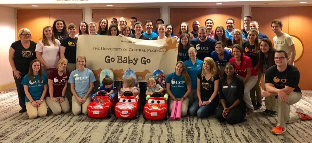 5d08f40e370a897cb9ef8361_Physical therapy students led by Dr. Jennifer Tucker for the Go Baby Go program-min