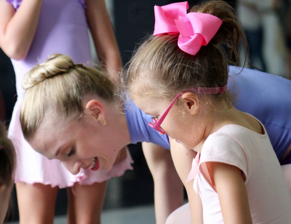 https://www.ameridisability.com/wp-content/uploads/2017/07/5d09246ecb43f23bdbff1f79_Little-girl-at-an-adaptive-dance-class-called-Come-Dance-with-Us-participant-with-Orlando-Ballet-Companys-Ashley-Baszto.-Photo-by-Francesca-Agostino-min.jpg