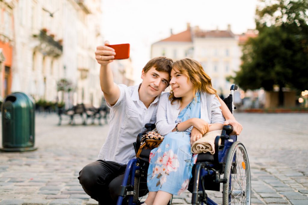 interabled couple taking a selfie 