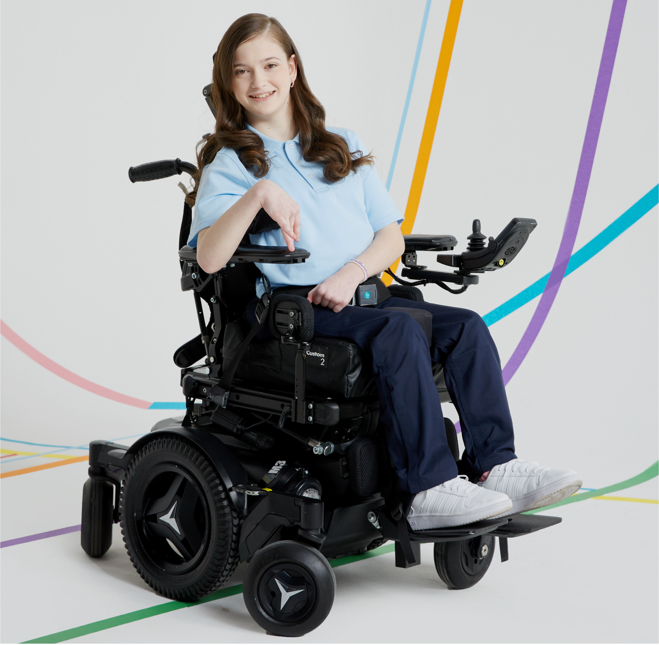 girl in wheelchair wearing adaptive schoolwear