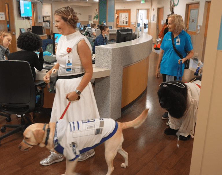Costumed Pet Therapy Dogs Visit Children’s Hospital on Halloween