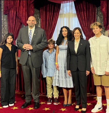 Vice President Kamala Harris swore in Senator John Fetterman, pictured with his wife Gisele and their three children