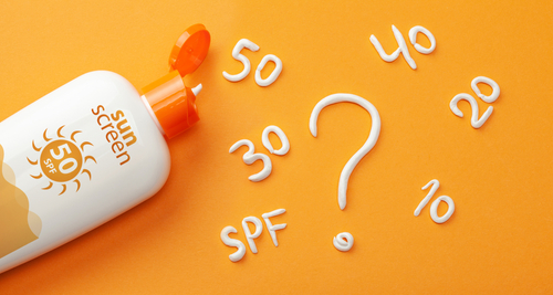Bottle of sunscreen with SPF numbers and a question mark | Sunscreen Tips for People with Disabilities