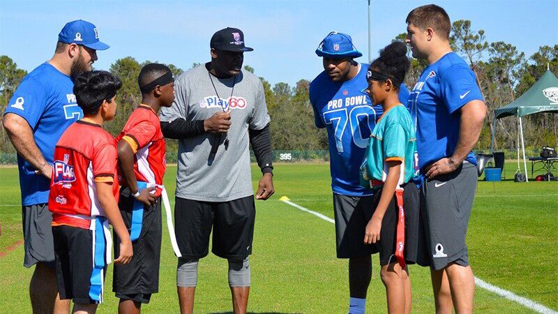 Coaches and players of unified flag football.