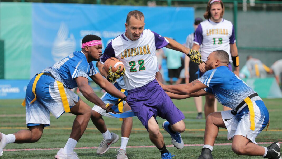 Group of flag football players during the Special Olympics game.