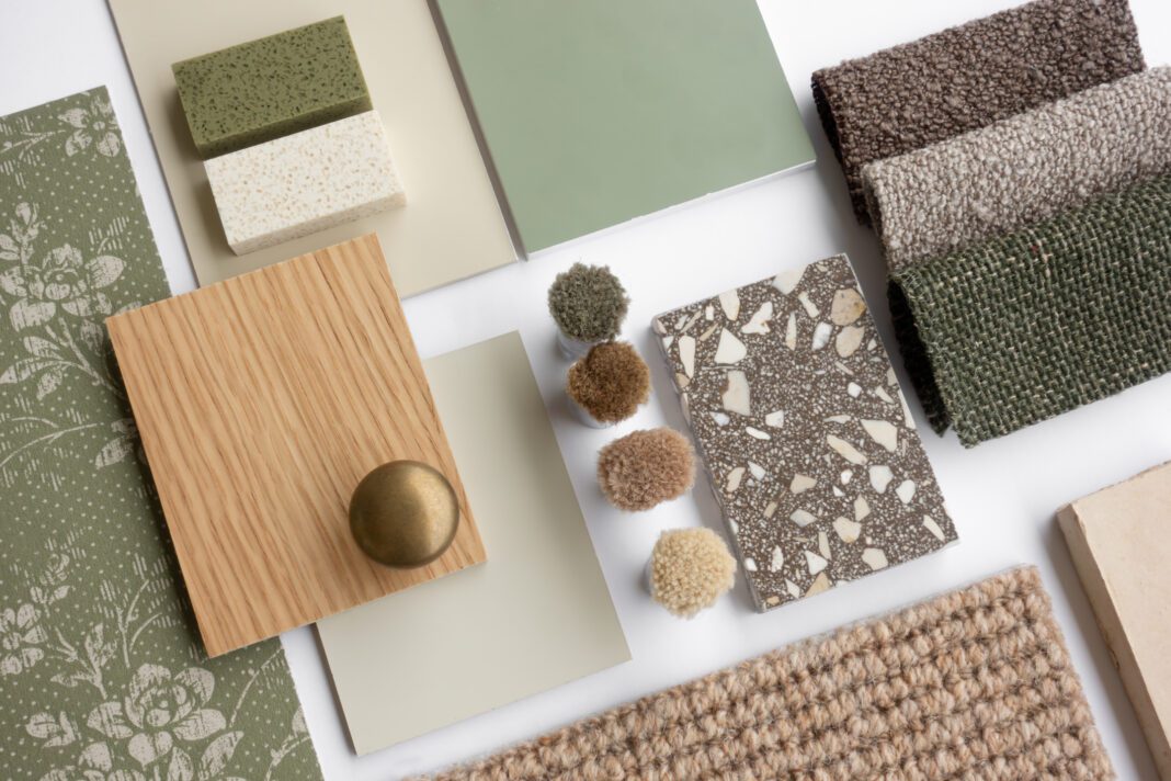 Earthy Green Interior Design Material Sample Board with Fabrics, Terrazzo, Wood, and Wallpaper for Home Decoration Mood Board Concept