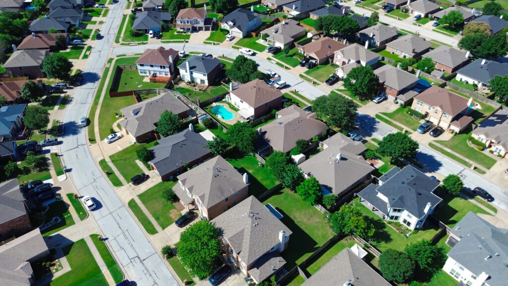 Backyard pool residential arc spans South Arlington, Texas near Mansfield Webb Rd with homes positioned along looping streets where fenced yards, green lawns, bright pool anchor surrounding blocks.